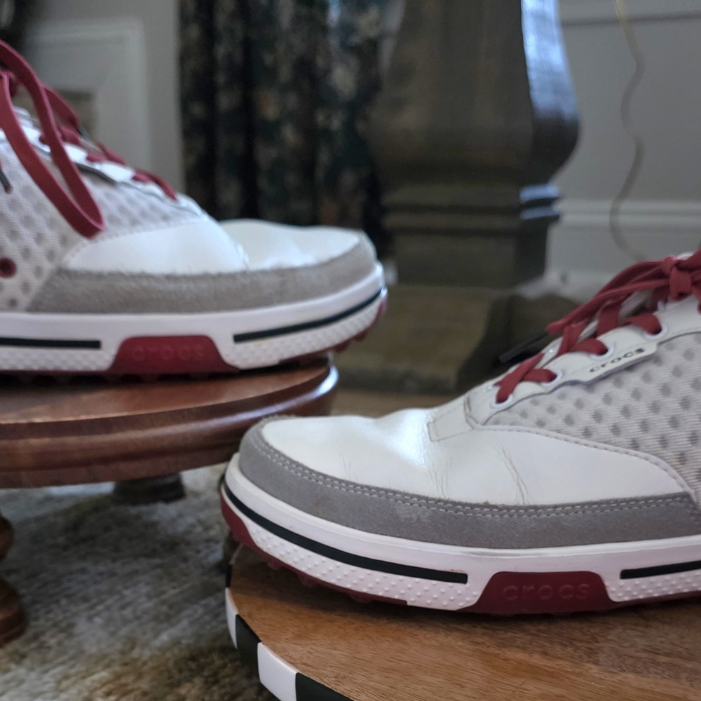 White and Gray Sneakers with Red Accents
